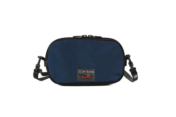 The Bantam in Navy Parapack and Coyote 210 Ballistic shell with shoulder strap